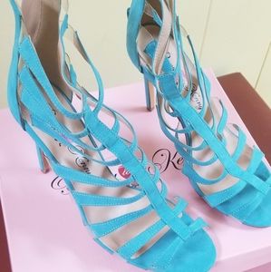 Turquoise color blocked heels